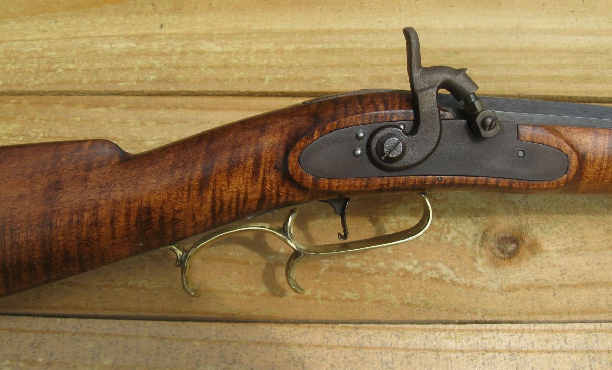 Caplock mechanism on a rifle