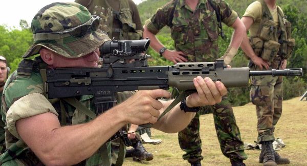 Dutch marine aiming a SA80 assault rifle