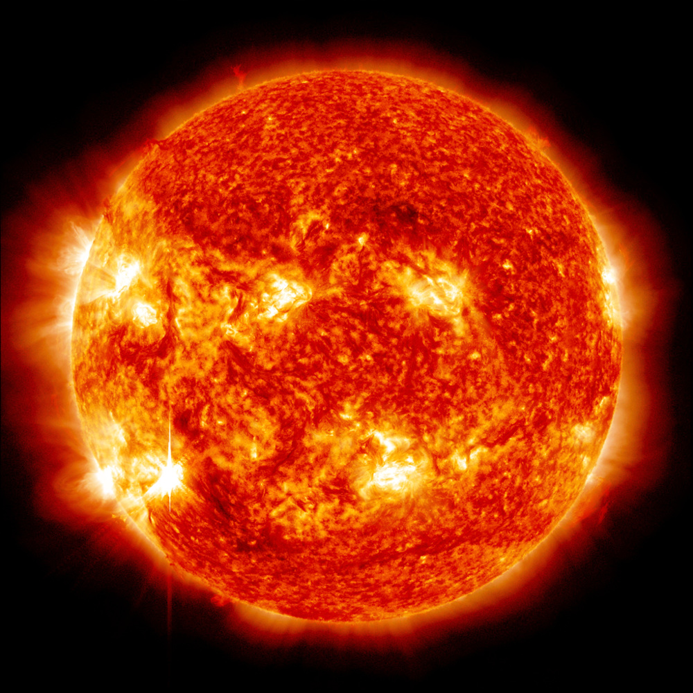 Sun with solar flare, photo by NASA